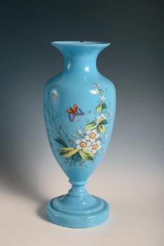A painted vase of turquiose glass